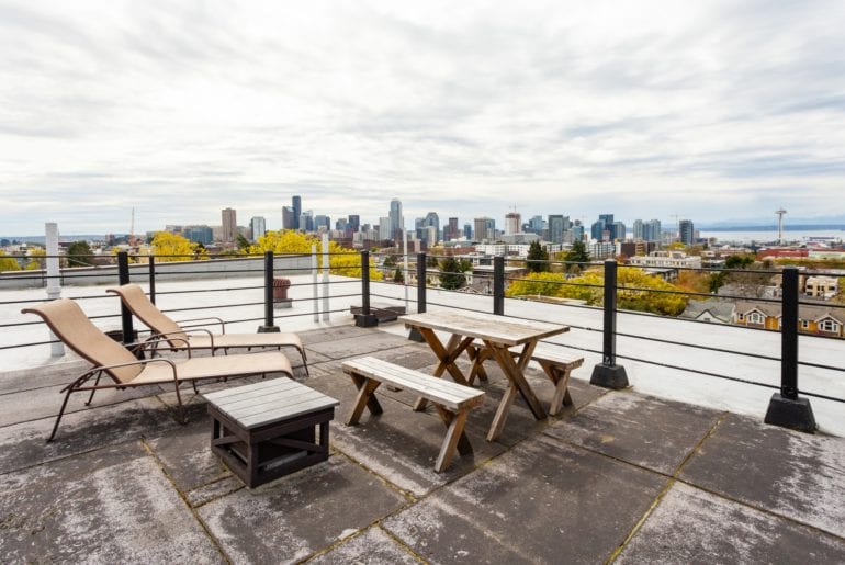 Seattle Pride Parade Rooftop patio with outdoor seating and city views