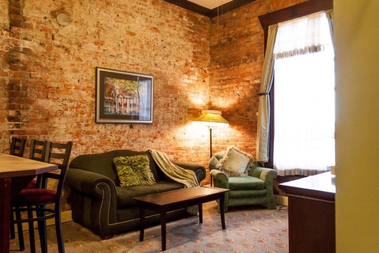 Seattle Comic Con Beautiful exposed brick give this apartment a homey feel.