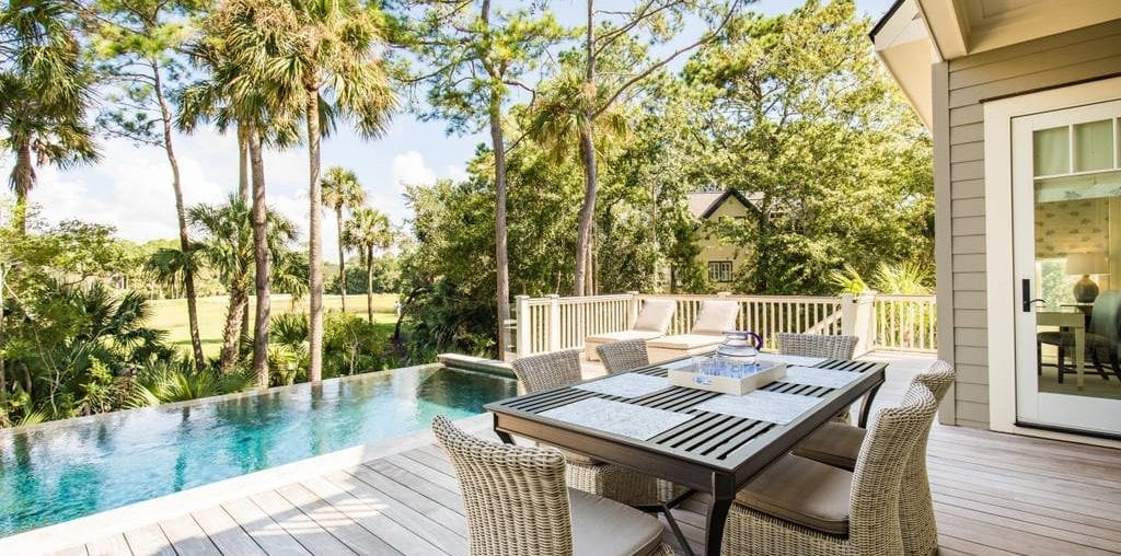 Beautiful patio and infinity pool overlook a Charleston golf course