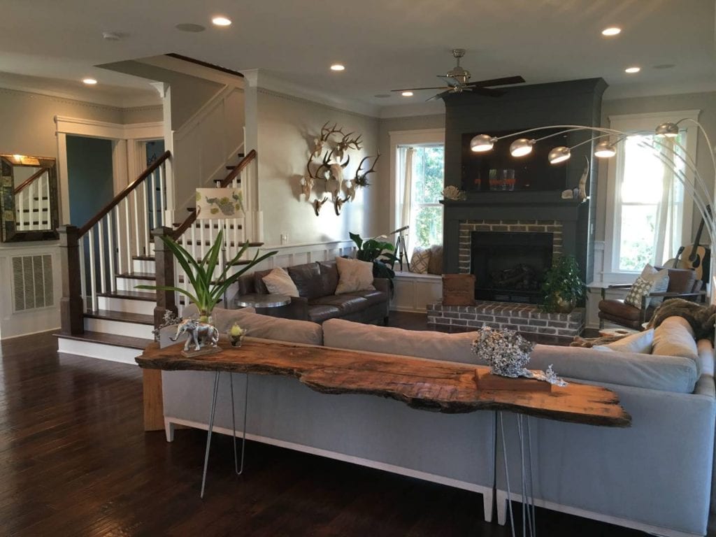 Stylish living room with a fireplace feature on Daniel Island