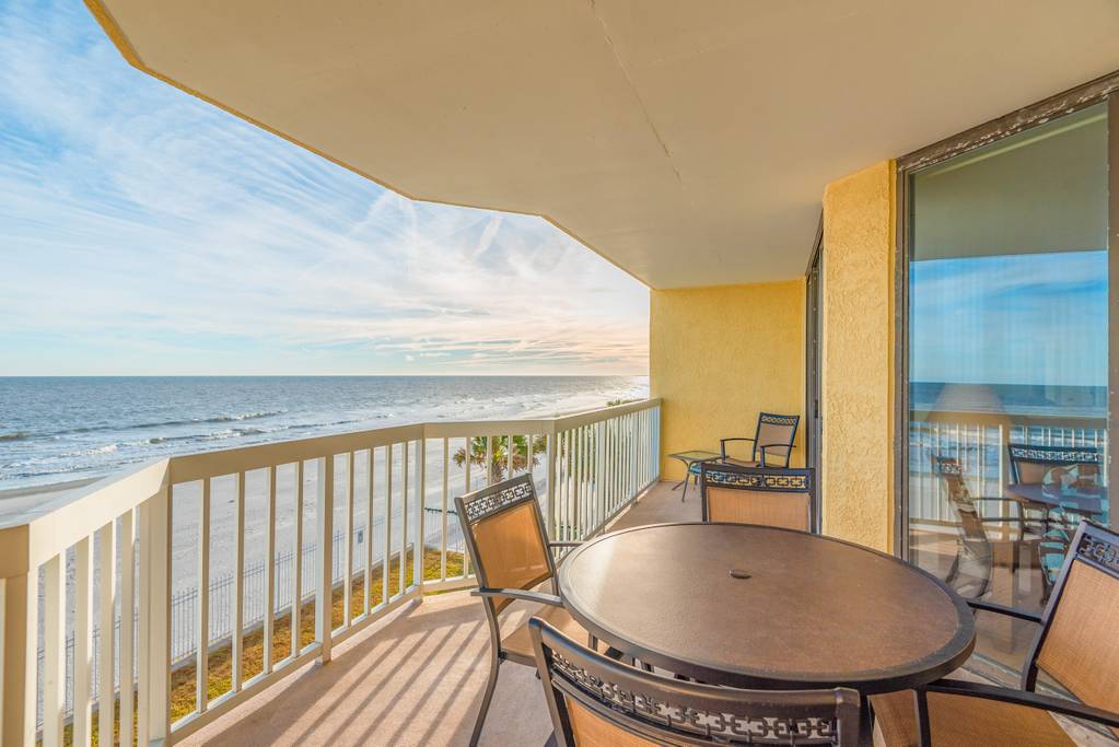 Covered patio gives this Folly Beach condo panoramic ocean views