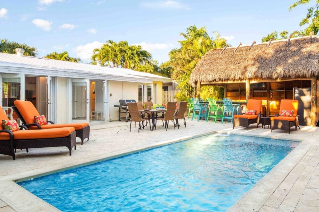 Sunny Key West Airbnb featuring in-ground pool and private tiki bar