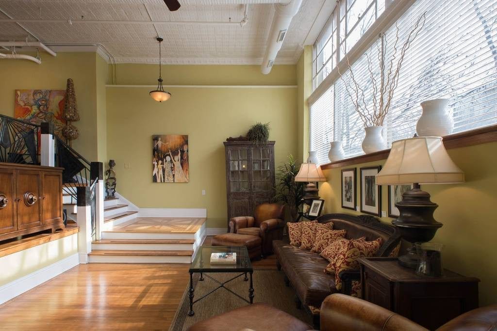Elegant furniture of the living room in this split level, Asheville apartment