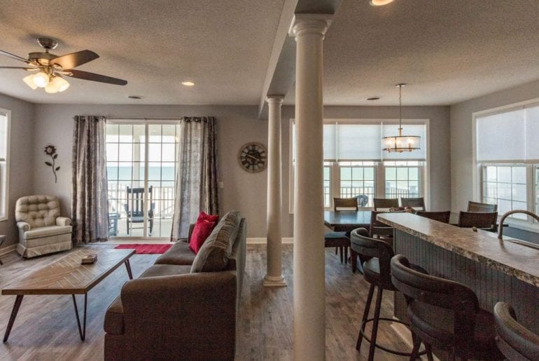 a living room and kitchen area