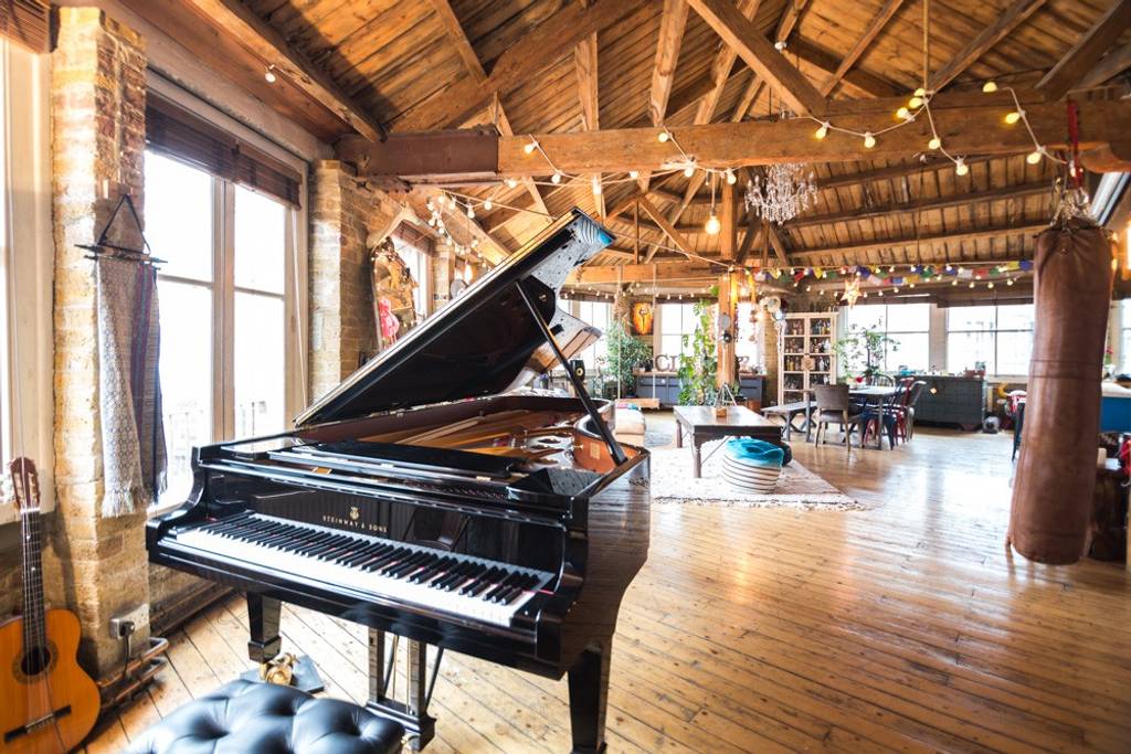 huge open loft with piano airbnb shoreditch london