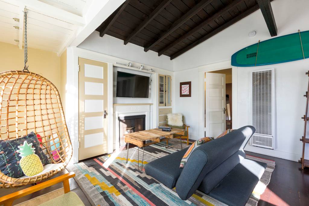 living area with surfboard in Los Angeles