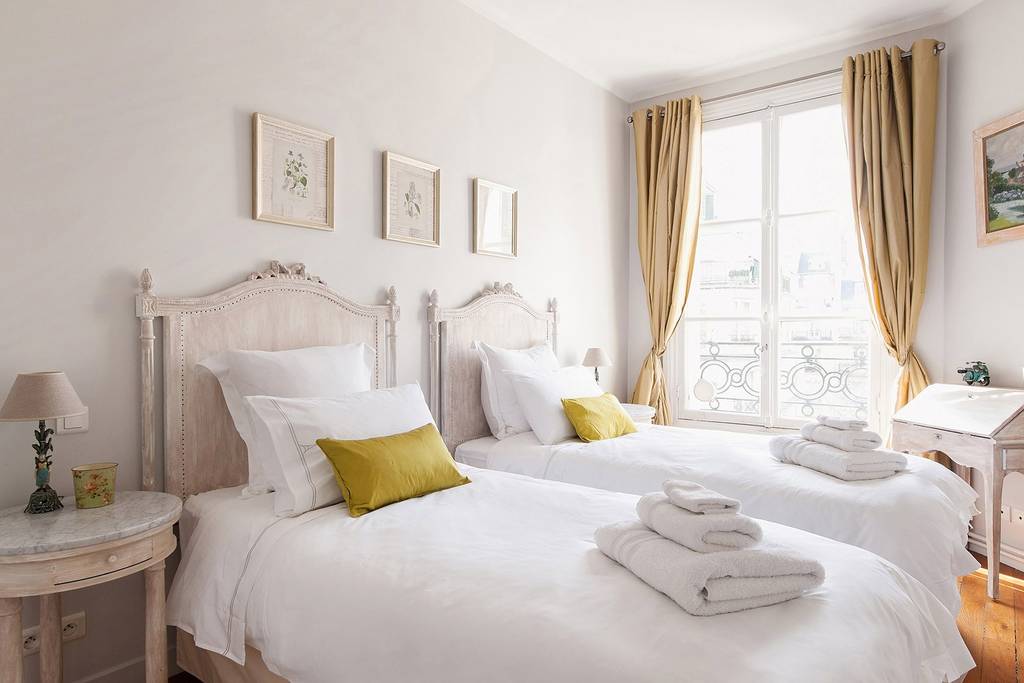 a bedroom in an Airbnb in Paris