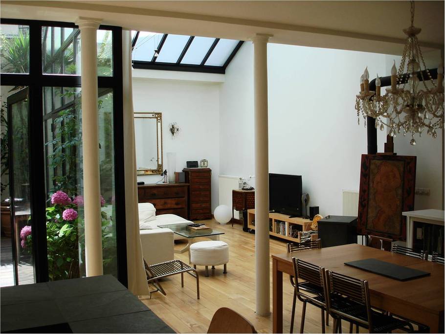 sun filled loft space in paris near opera