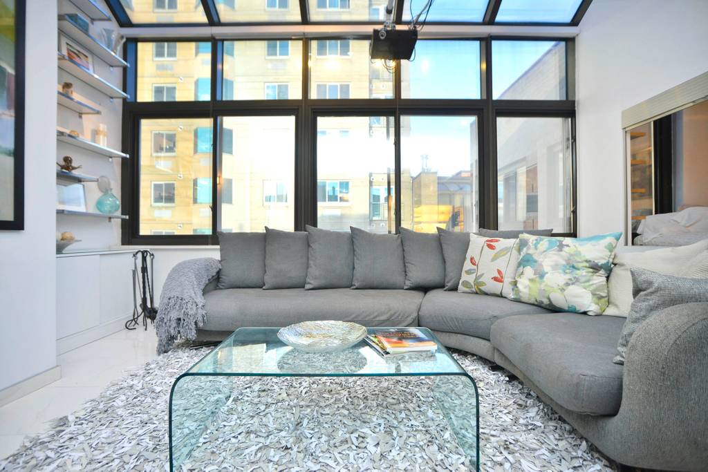 manhattan airbnb apartment with spiral staircase and jacuzzi tub