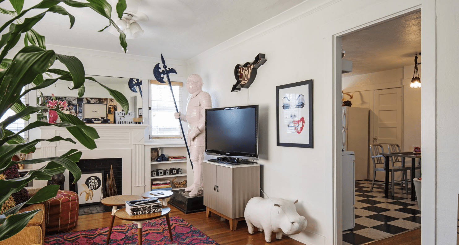 living area with a statue and a model hippo