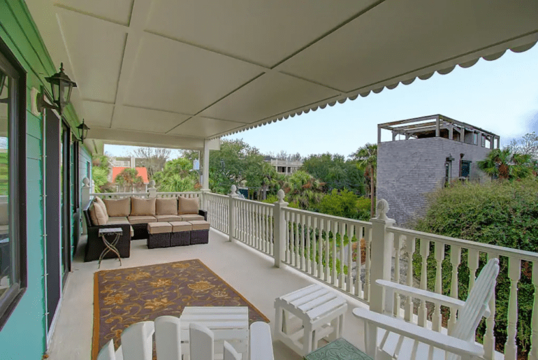 a balcony with a rug on it in Charleston SC