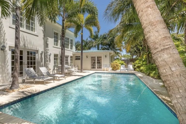 West Palm Beach pool surrounded by palm trees