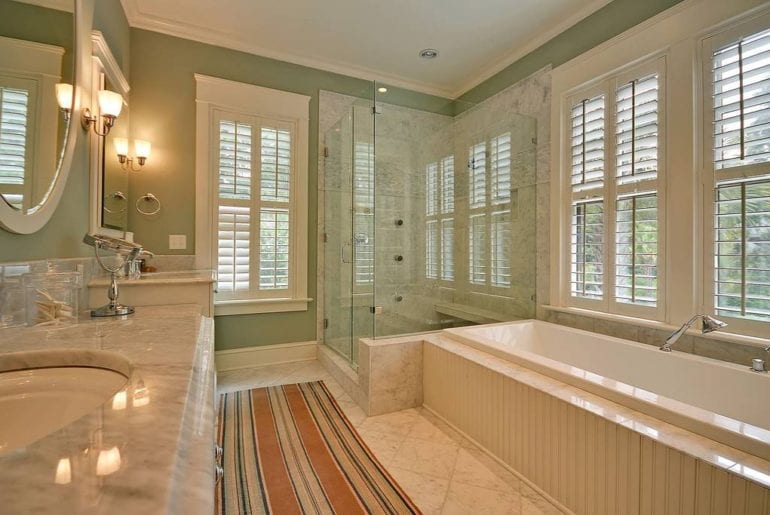 a bathroom with marble fittings in a charleston airbnb