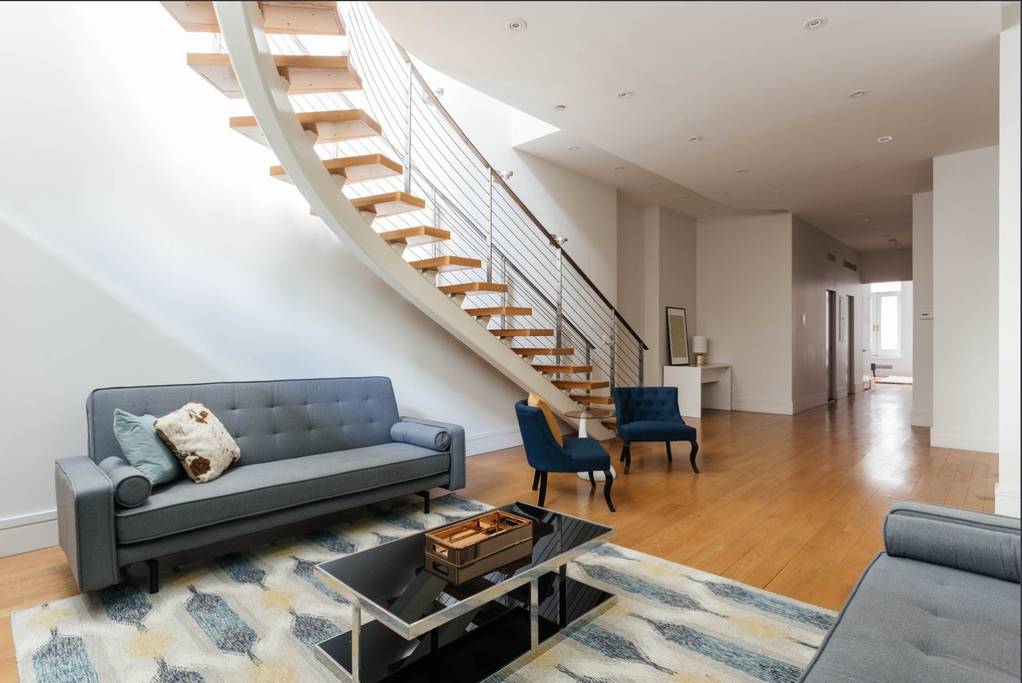 airy new york townhome with floating staircase airbnb