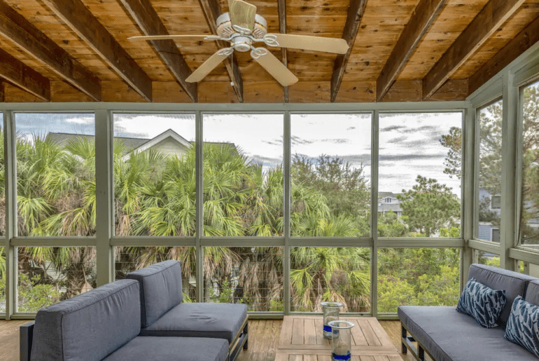 a view of palm trees from a Charleston Airbnb