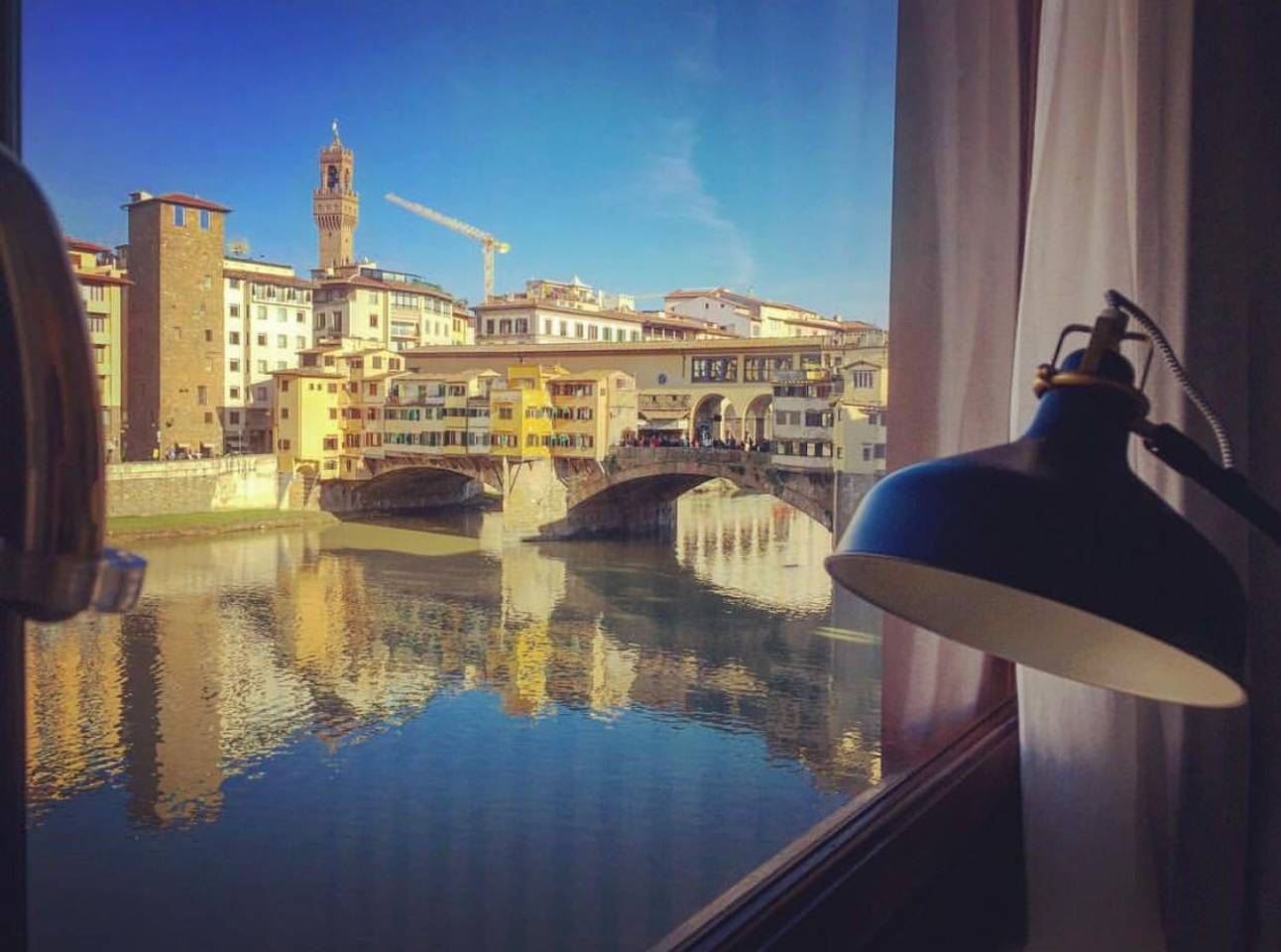 views of ponte vecchio from this airbnb apartment 