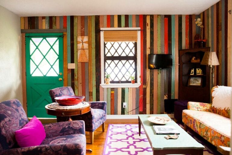 The vibrant, multicolored walls give this home a unique vibe